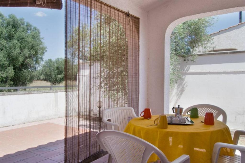 Photo de la galerie de l'établissement Villa Antonella con Piscina nel Boomerang Village a Torre Colimena, à Torre Colimena