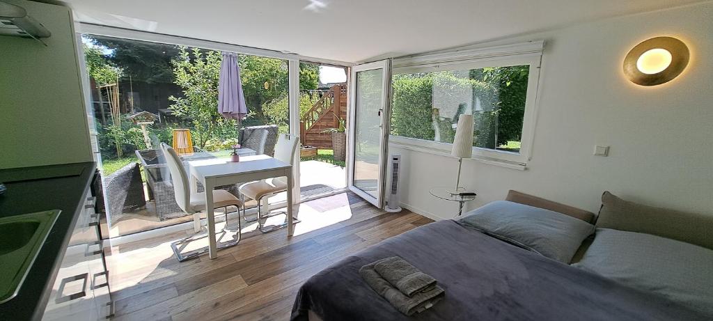 All-in-One Apartment mit eigener Sonnenterrasse im Garten 7