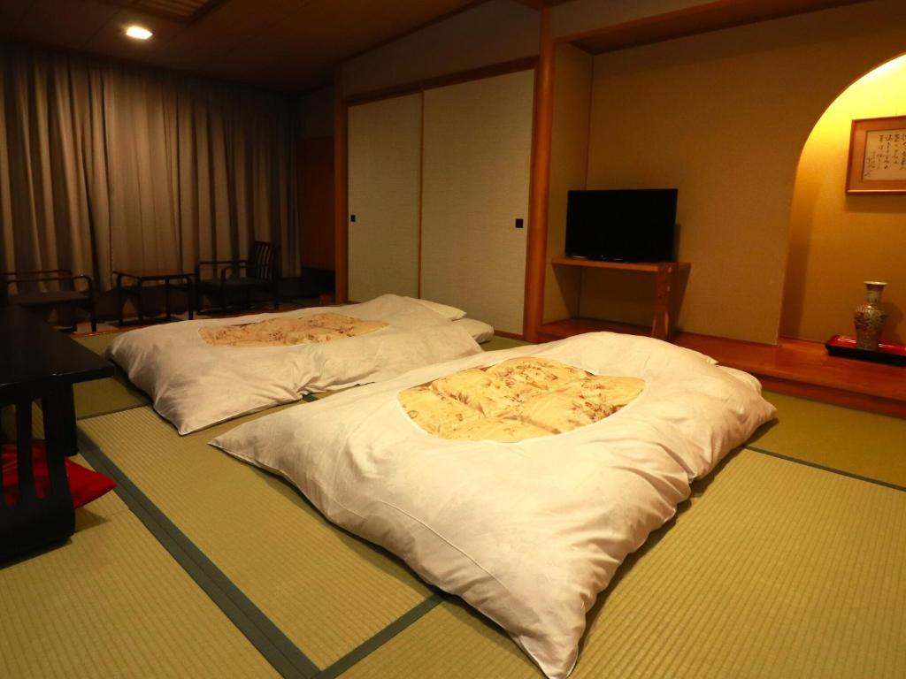 Cette chambre comprend 2 lits. dans l'établissement Hotel Ichii, à Kusatsu 37 autres photos