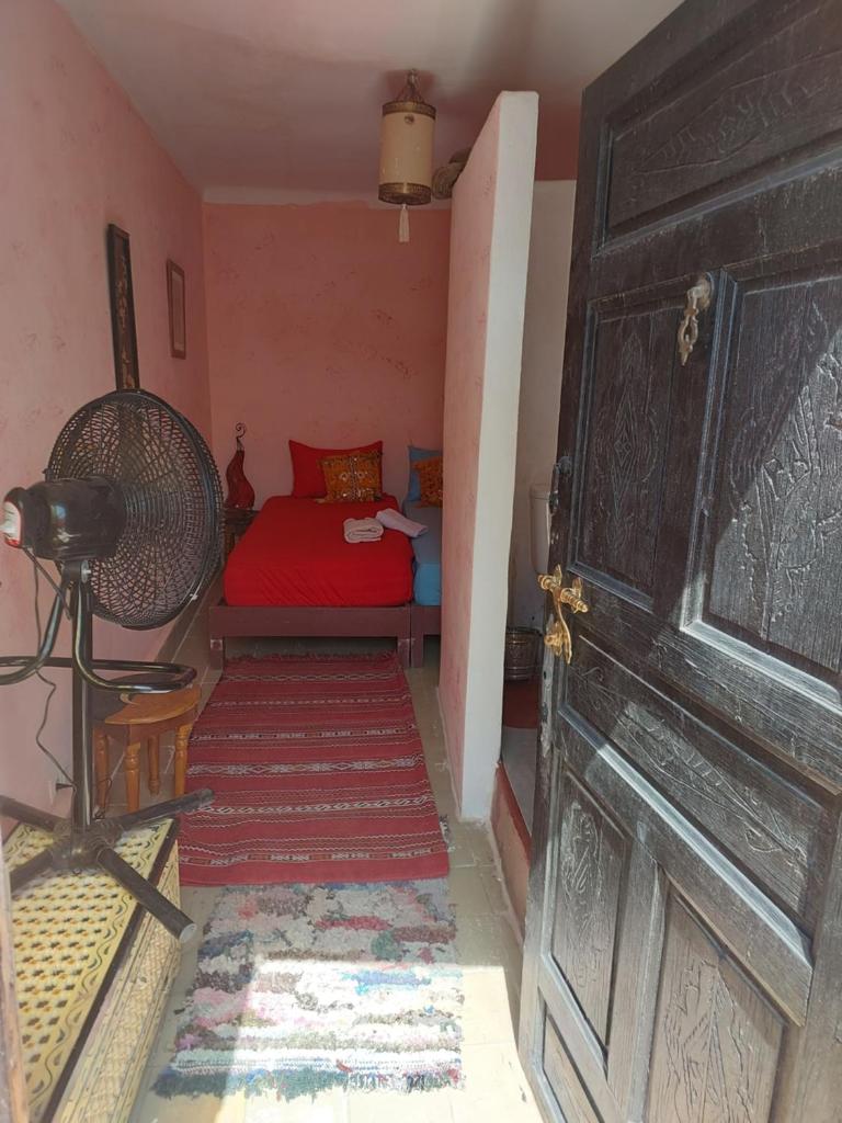 Un ou plusieurs lits dans un hébergement de l'établissement RIAD Redous