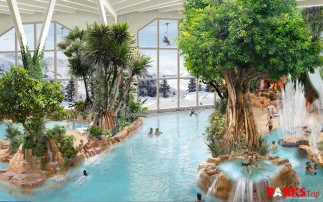 une grande piscine intérieure avec des personnes séjournant dans un complexe dans l'établissement Avoriaz le M1212, à Avoriaz