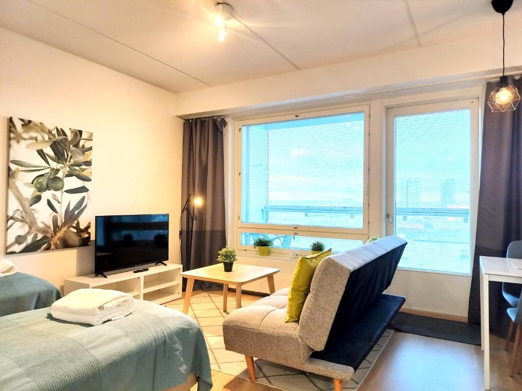 Kotimaailma Apartments - Kaunis 10 kerroksen parvekkeellinen yksiö - Peltokatu 3