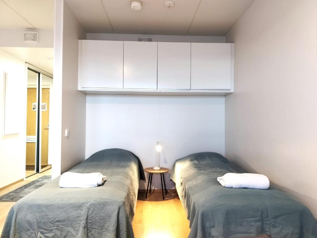 Kotimaailma Apartments - Kaunis 10 kerroksen parvekkeellinen yksiö - Peltokatu 4