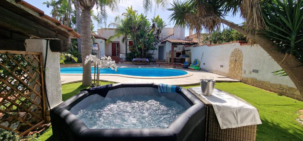 aificialificialificialificialificialificialificialificialificialificialificialificialificialificial dans l'établissement RIFLESSI D'AZZURRO - la vacanza dei tuoi sogni, à Castelvetrano