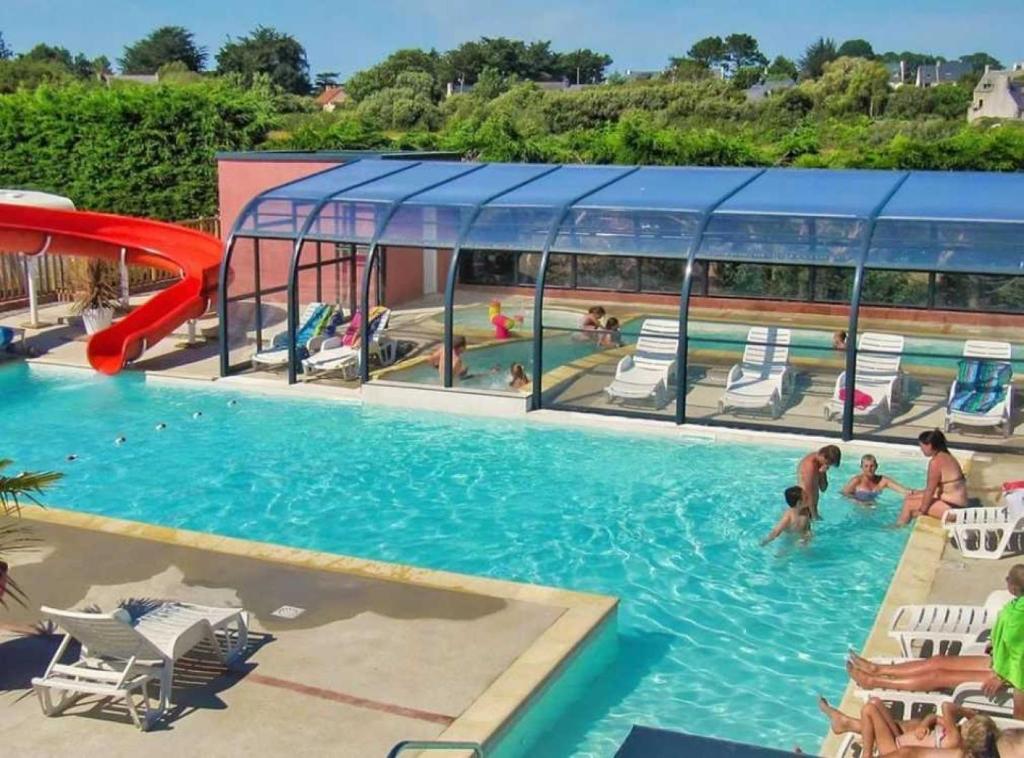 Photo de la galerie de l'établissement Camping - Piscine - efadci, à Pleumeur-Bodou 35 autres photos