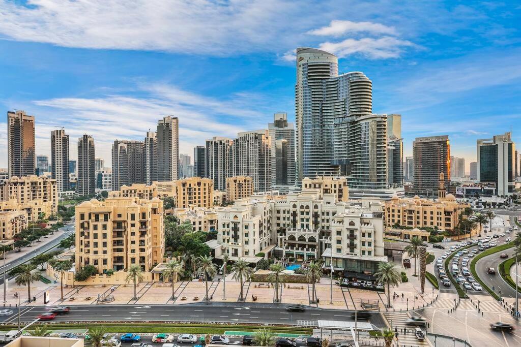 Walk to Burj Khalifa from this 2BR with Skyline Balcony View