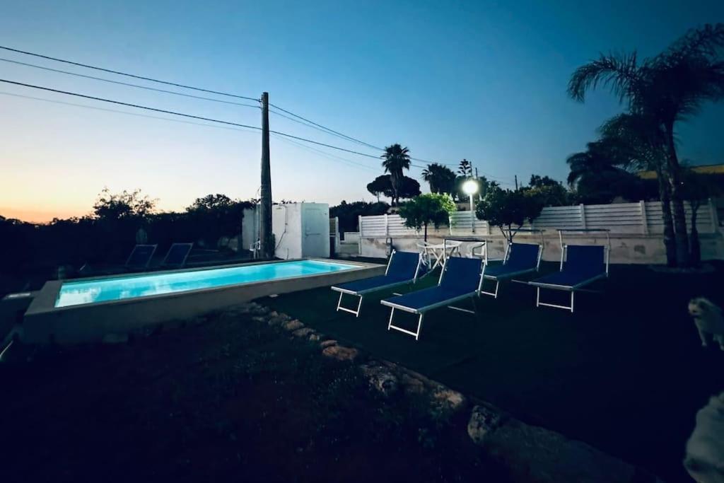 Photo de la galerie de l'établissement Villetta Loris con piscina By Apulia home, à Torre San Giovanni 34 autres photos