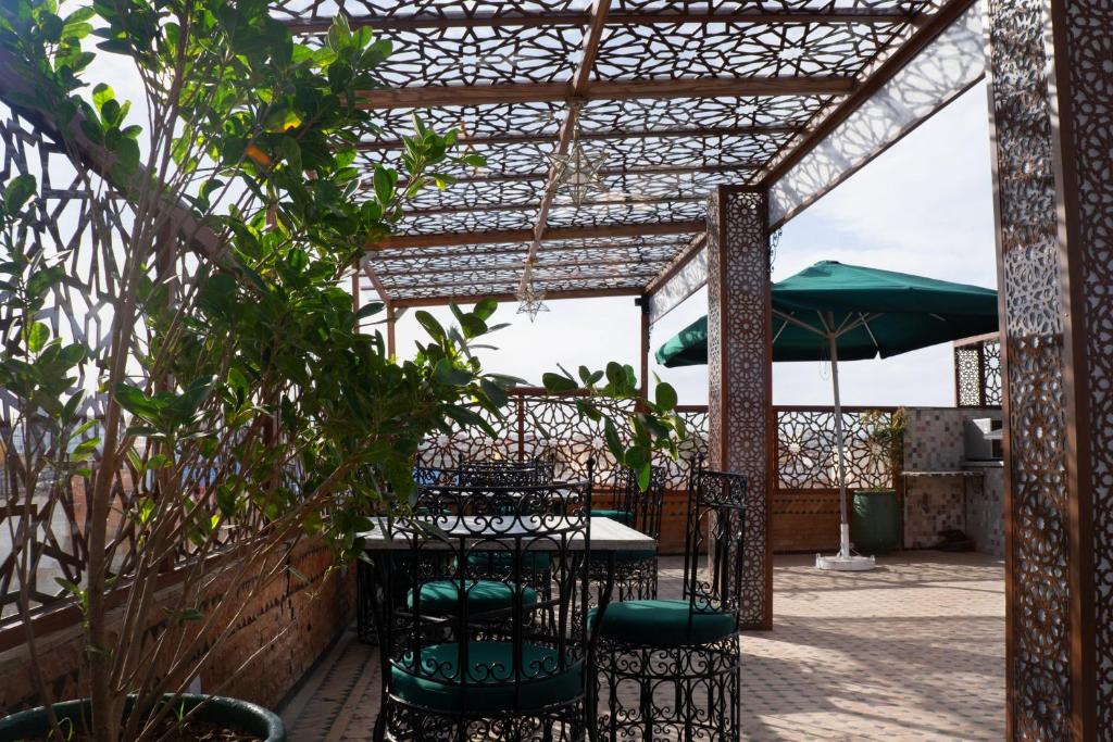 Restaurant ou autre lieu de restauration dans l'établissement Riad Asswar