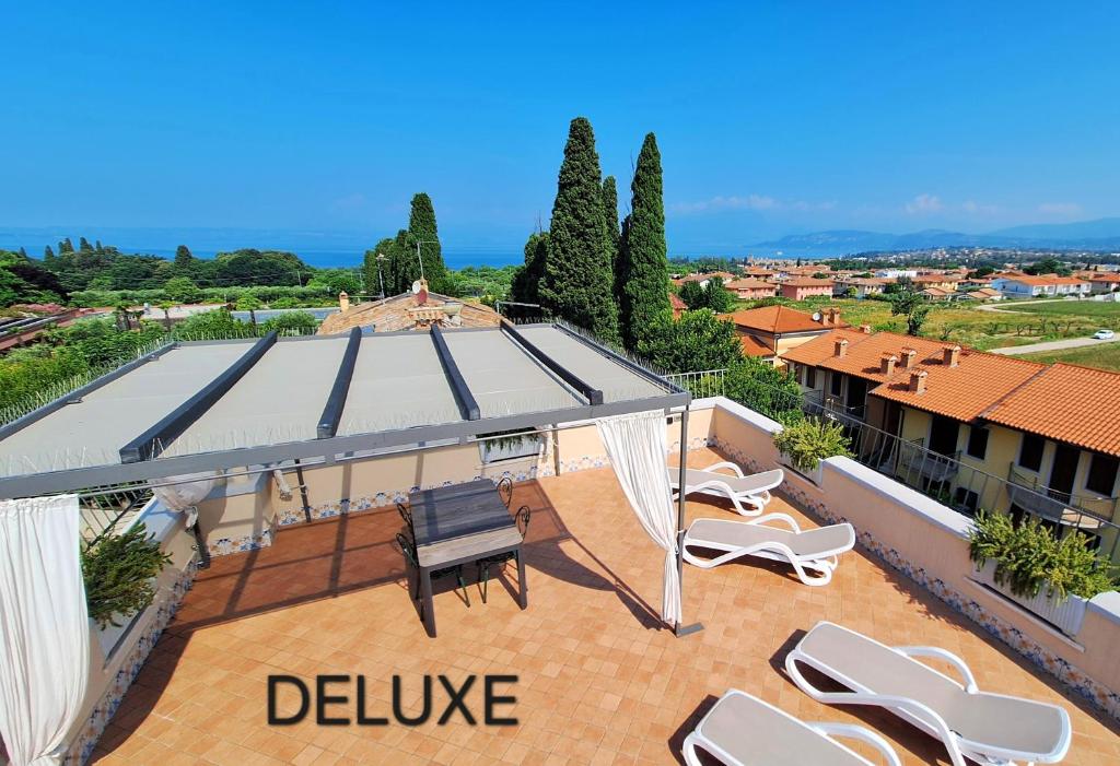 Attico Deluxe Vista Lago - Al Glicine Apartments