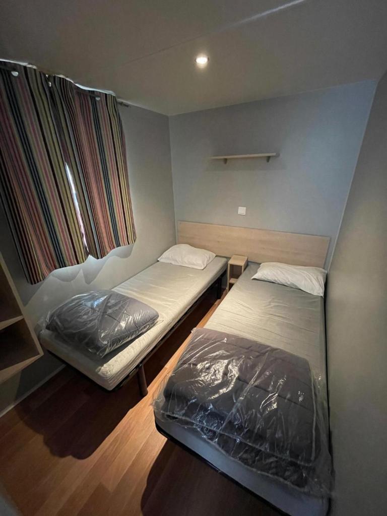 Photo de la galerie de l'établissement Mobil Home dans camping 3 étoiles, à Agde