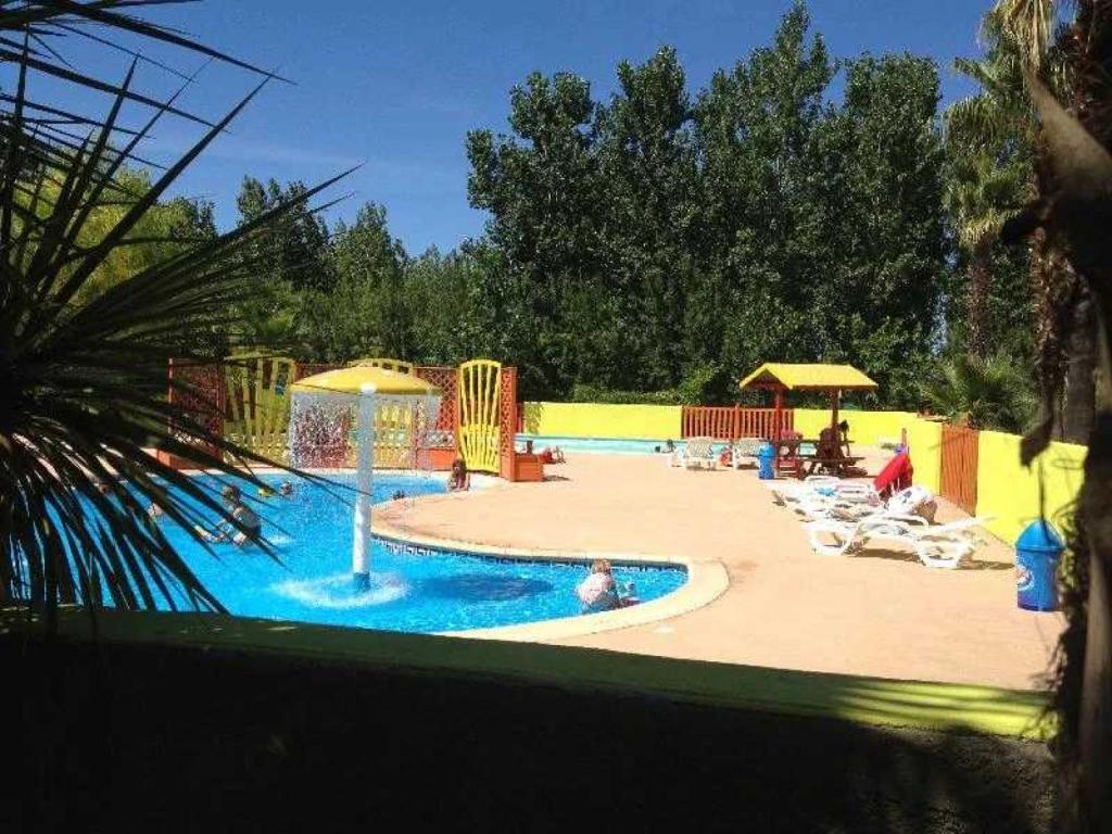 Photo de la galerie de l'établissement Camping 4 étoiles - Piscine - ccaffbg, à Villeneuve-lès-Béziers