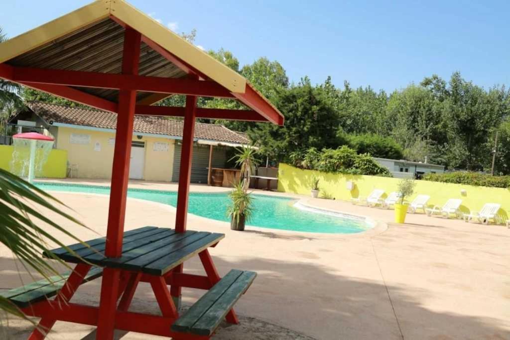 Photo de la galerie de l'établissement Camping 4 étoiles - Piscine - ccaffbg, à Villeneuve-lès-Béziers 48 autres photos