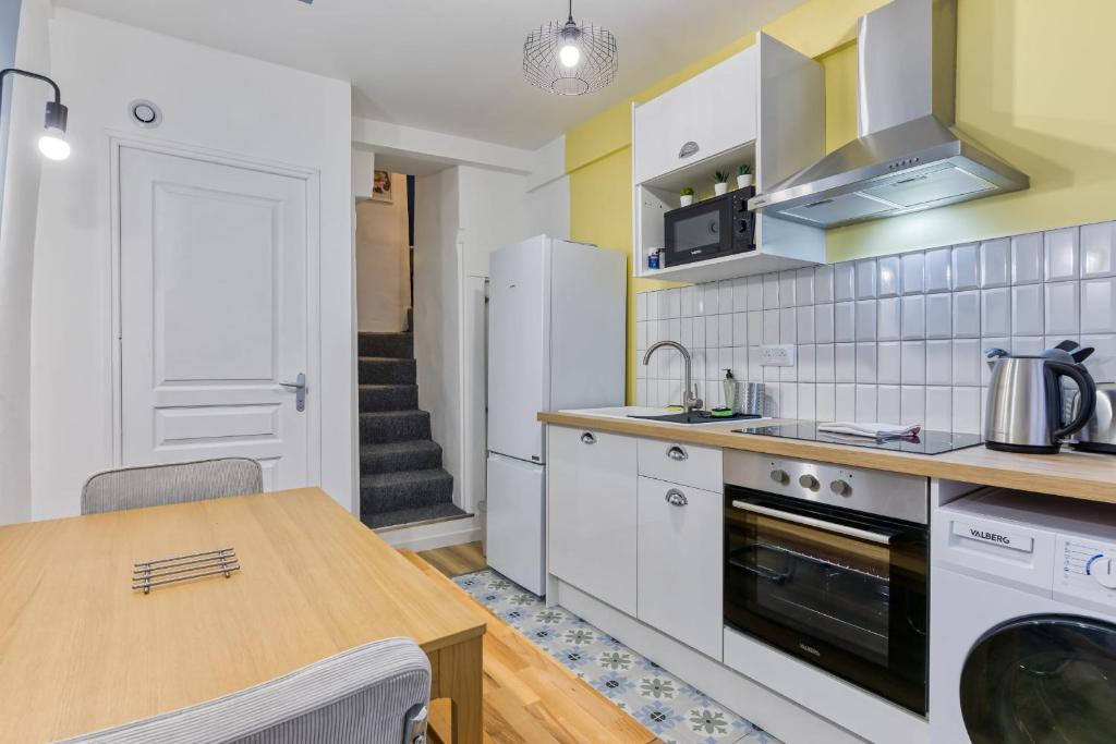 Loulou maison de ville sur 4 niveaux au coeur de ville 6