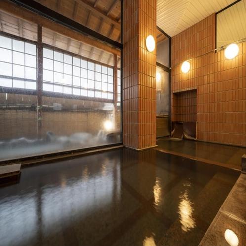 Cette grande chambre dispose d'un sol en verre et de grandes fenêtres. dans l'établissement Kawaichiya Ryokan, à Nozawa Onsen