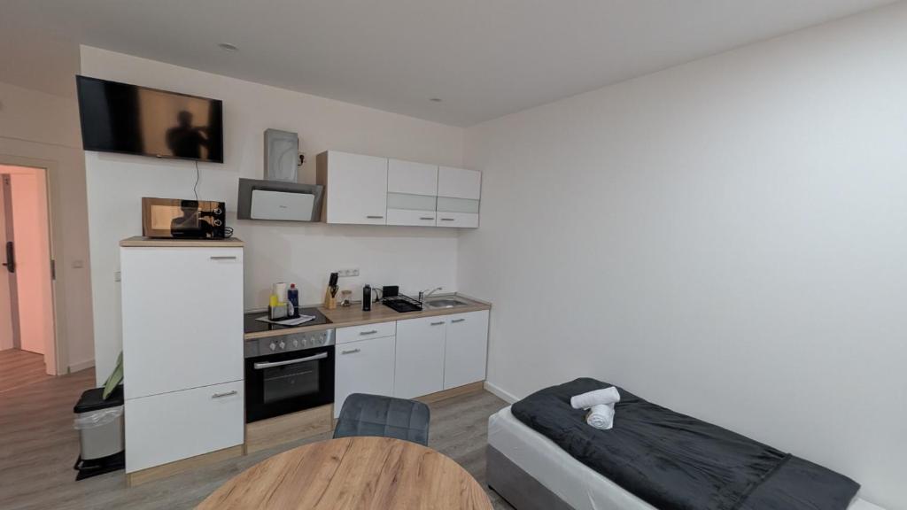 LeHaStays Apartments - FS7 I Küche I WLAN I SmartTV I Einzelbetten I Parkplatz 4