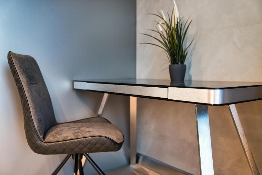 Modern central Riga apartment with balcony, gym access, dedicated parking, kitchen & AC 7