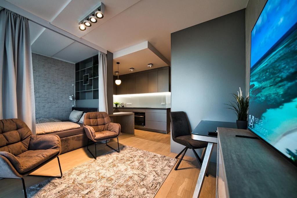 Modern central Riga apartment with balcony, gym access, dedicated parking, kitchen & AC 5