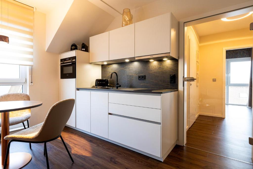 Exclusive Suite mit Tiefgarage in Nähe Messe-BMW-Porsche-DHL-Flughafen-Flugzeugwerk der Deutsche Aircraft 8