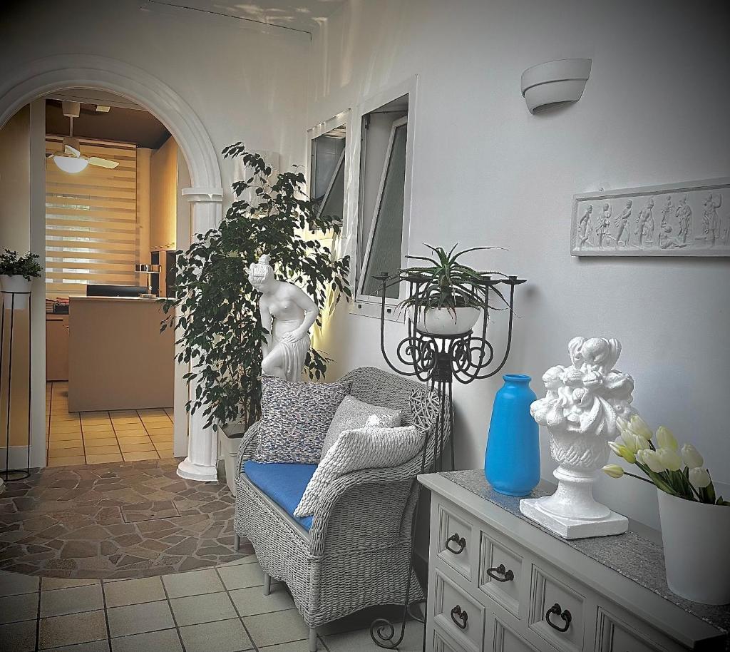 Coin salon dans l'établissement Hotel La Parigina