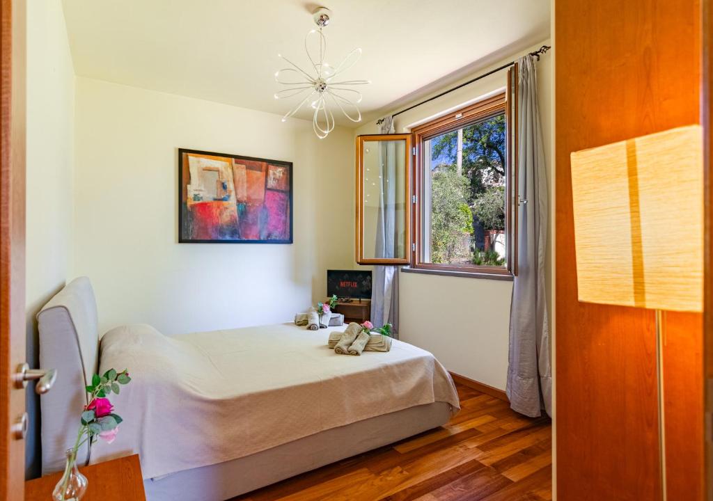 Photo de la galerie de l'établissement Villa con Piscina immersa nel Verde - Montecarlo - Horizonte Selections, à Montecarlo