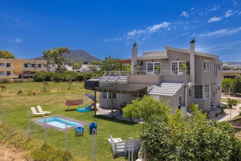 Coral Paradise Luxury Modern Family Villa with Jacuzzi, Pool View & Parking in Rhodes Island 4