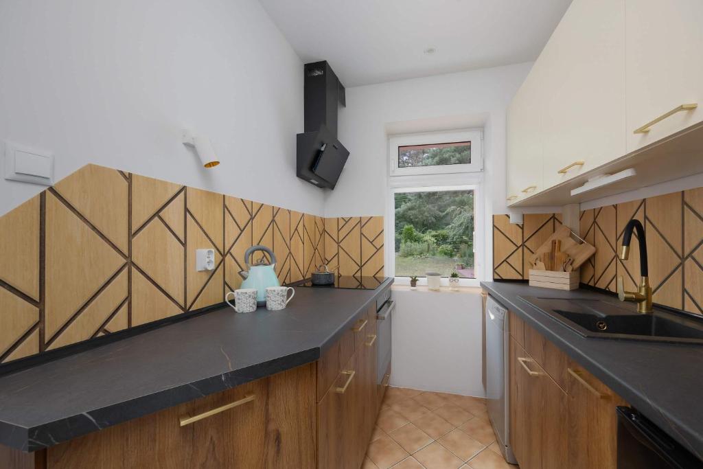Charming House in the Capital with Two Parking Spaces by Noclegi Renters 4