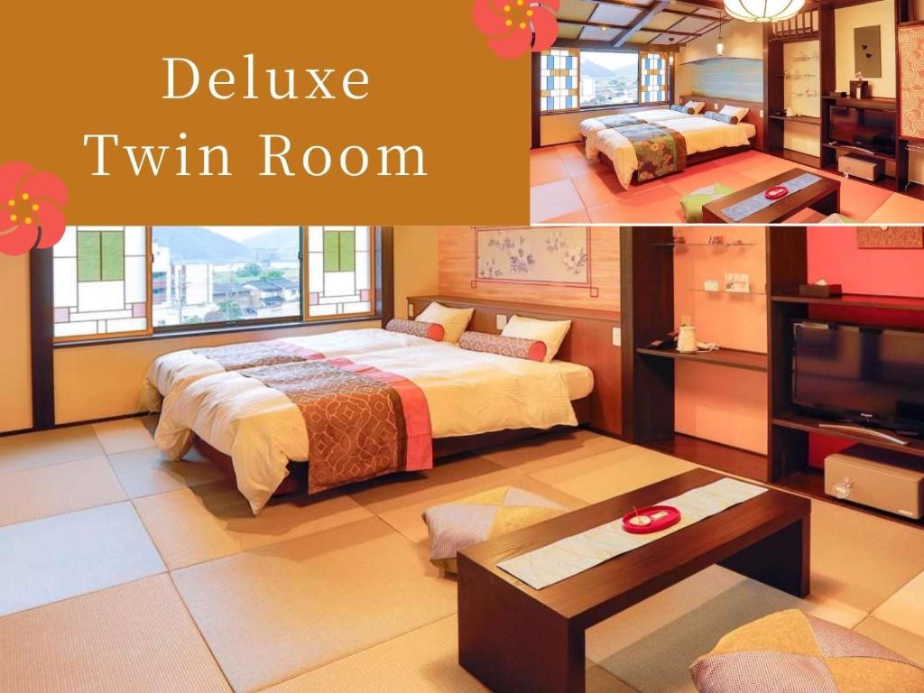 une chambre d'hôtel avec deux lits et une télévision dans l'établissement Kinosaki Tenboen, à Toyooka 37 autres photos