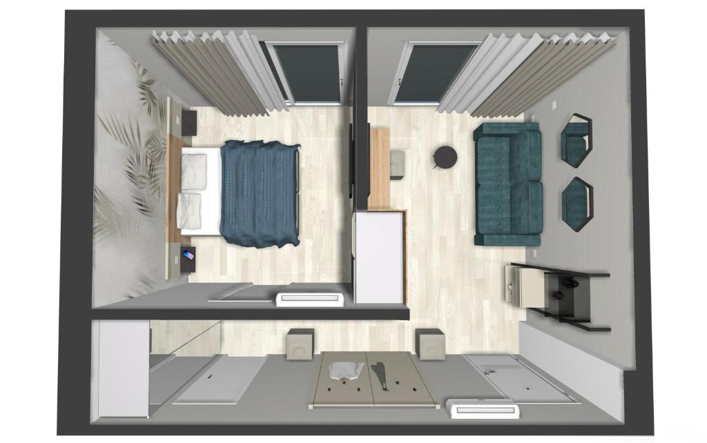 un dessin d'une petite salle de bain avec des serviettes bleues dans l'établissement Hotel Golf ***S, à Bibione