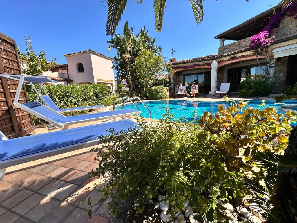 Photo de la galerie de l'établissement Villa Fenicotteri with private Pool in San Teodoro, à San Teodoro