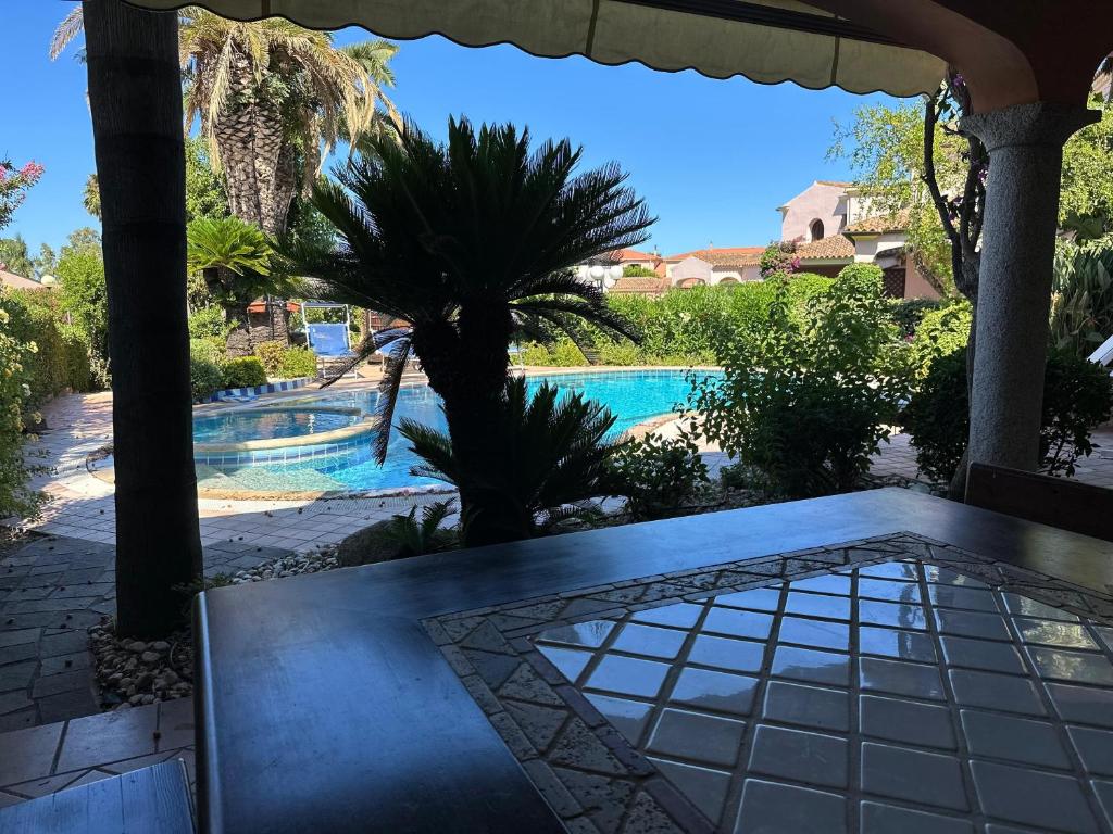 Photo de la galerie de l'établissement Villa Fenicotteri with private Pool in San Teodoro, à San Teodoro