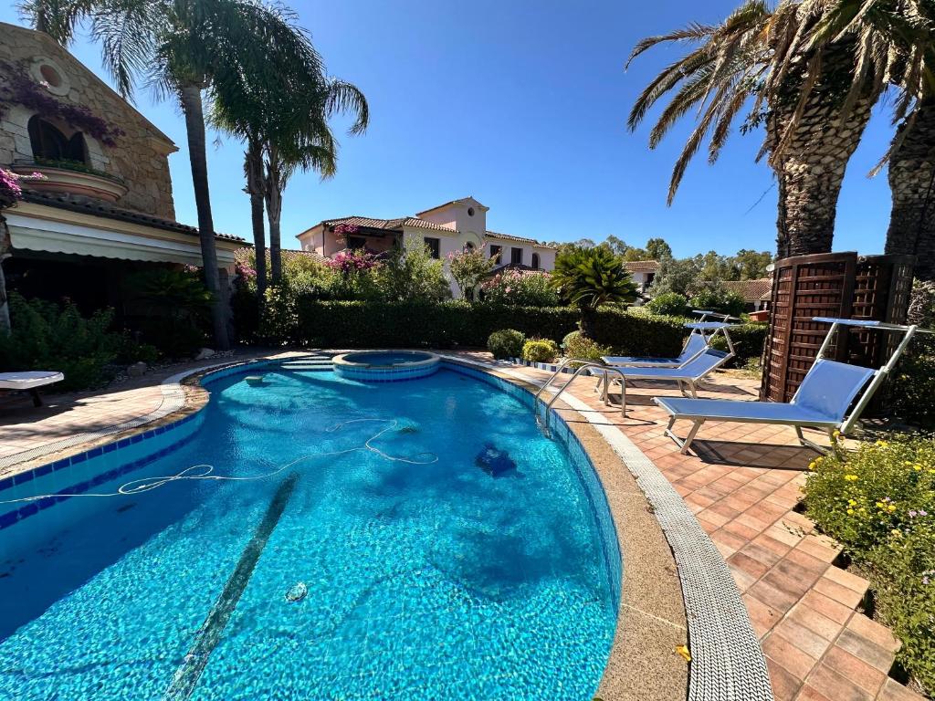 Photo de la galerie de l'établissement Villa Fenicotteri with private Pool in San Teodoro, à San Teodoro 43 autres photos