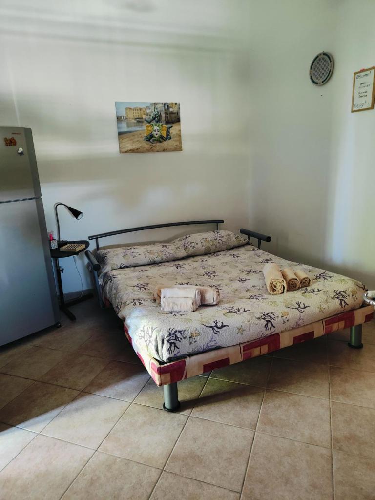 Un ou plusieurs lits dans un hébergement de l'établissement Holiday in Paradise 10 autres photos