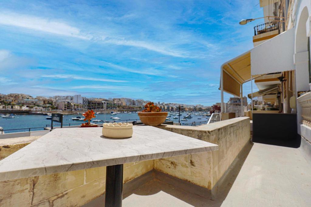 Traditional Maltese Townhouse with Backyard Garden and Seafront Location 4