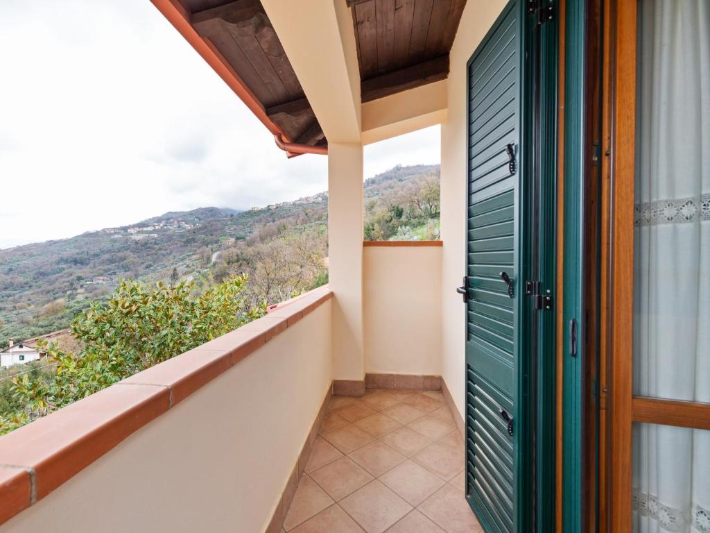 une porte donnant sur un balcon avec vue. dans l'établissement Villa in San Mango with Pool and Hot Tub, à San Mango dʼAquino