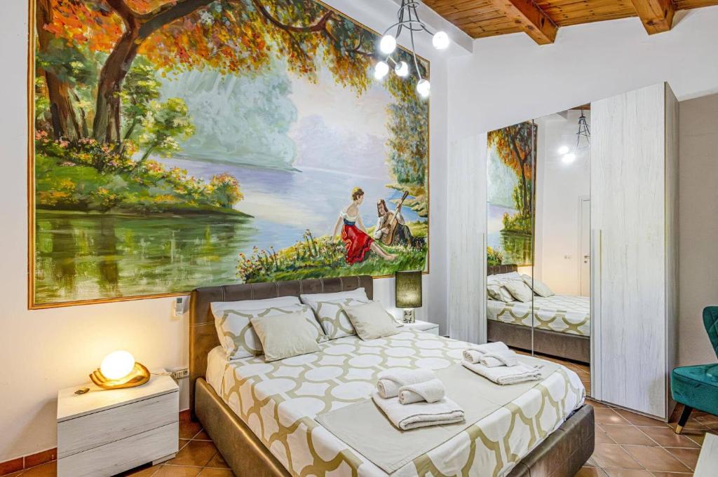 une chambre avec un grand tableau sur le mur dans l'établissement Villa Ardith by Villa Plus, à Raguse