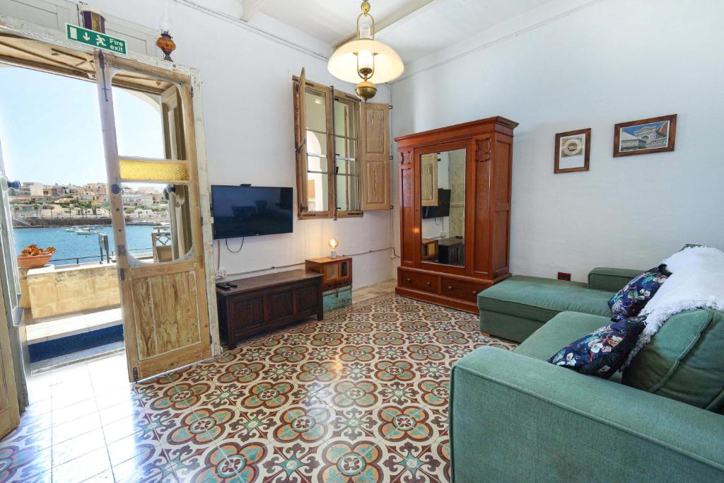 Traditional Maltese Townhouse with Backyard Garden and Seafront Location 2