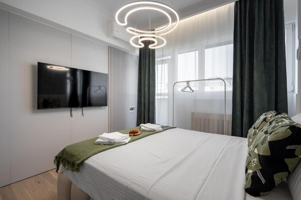 City - Center 1BR with Private Balcony 2