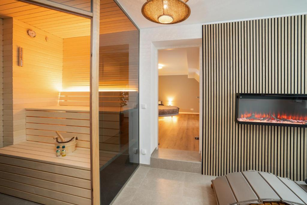 Luxury Wellness Suite with Sauna & Whirlpool by HERO HOMES 1
