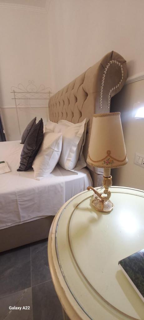 PALAZZO NOVECENTO Centro Storico Rooms & Wellness