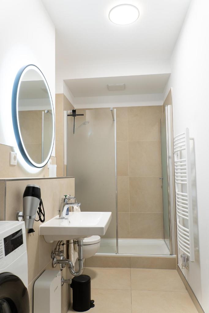 New central 2-3 room apartments with parking near train station & casino 8