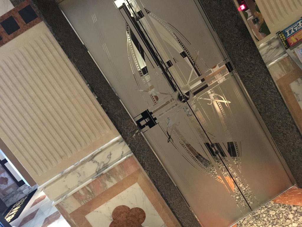 - la fermeture d'une porte vitrée avec des stores dans l'établissement Hotel W-ARAMIS -W GROUP HOTELS and RESORTS-, à Tokyo 50 autres photos