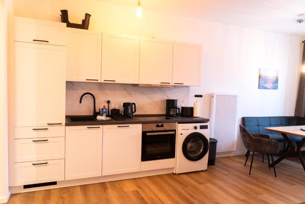 New central 2-3 room apartments with parking near train station & casino 8