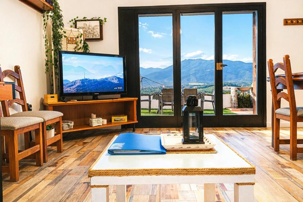 Ca la Nena Morena - Refugio cálido con chimenea y vistas al Montseny 4