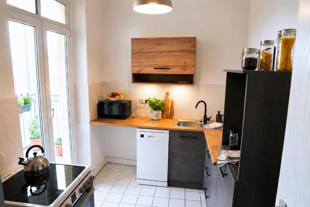 Große Wohnung mit 3 Schlafzimmern & 6 Boxspringbetten, WLAN, Smart TV, Parkplatz, Waschmaschine & Trockner 3