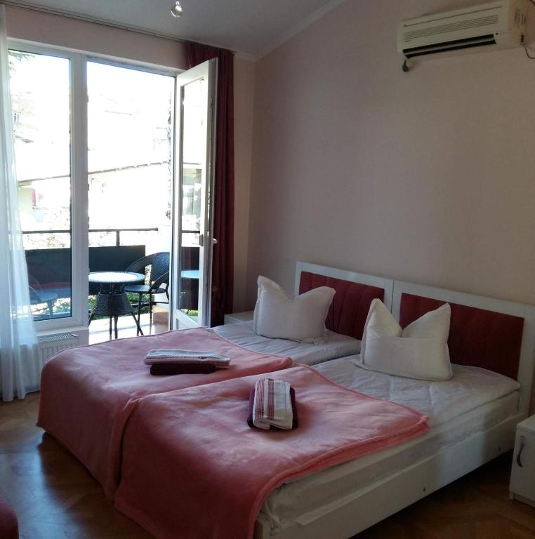 Postel nebo postele na pokoji v ubytování Hotel Renesans