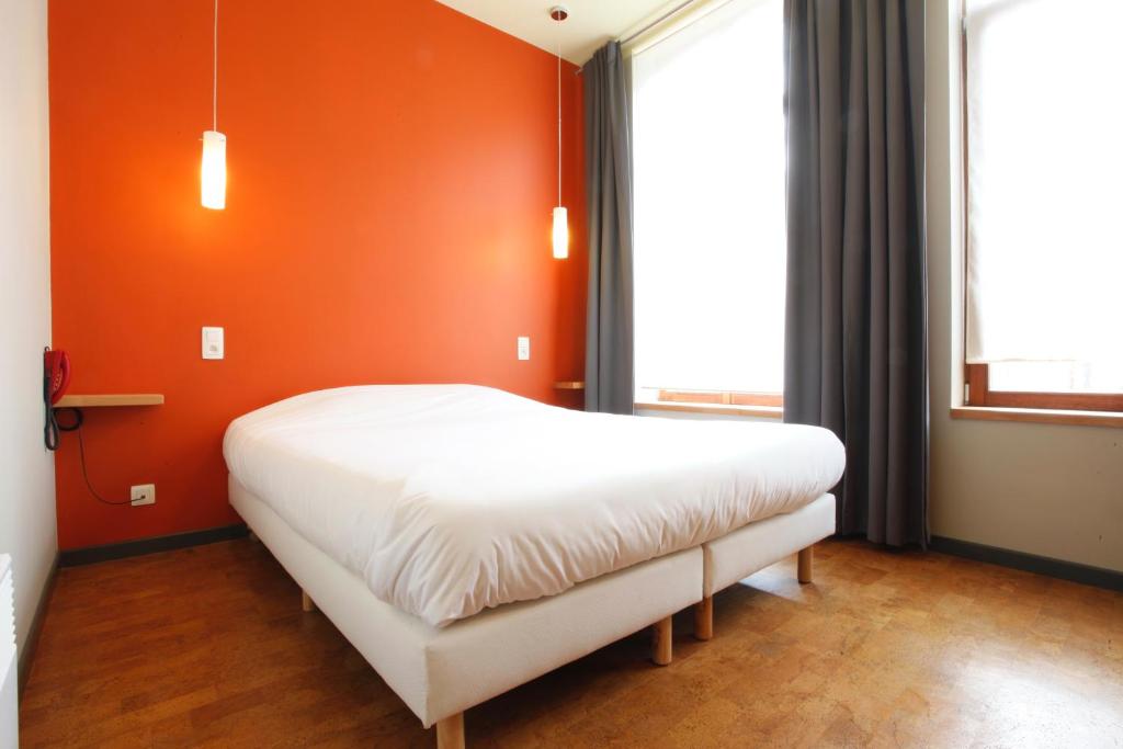Postel nebo postele na pokoji v ubytování Hotel O Mal Aime