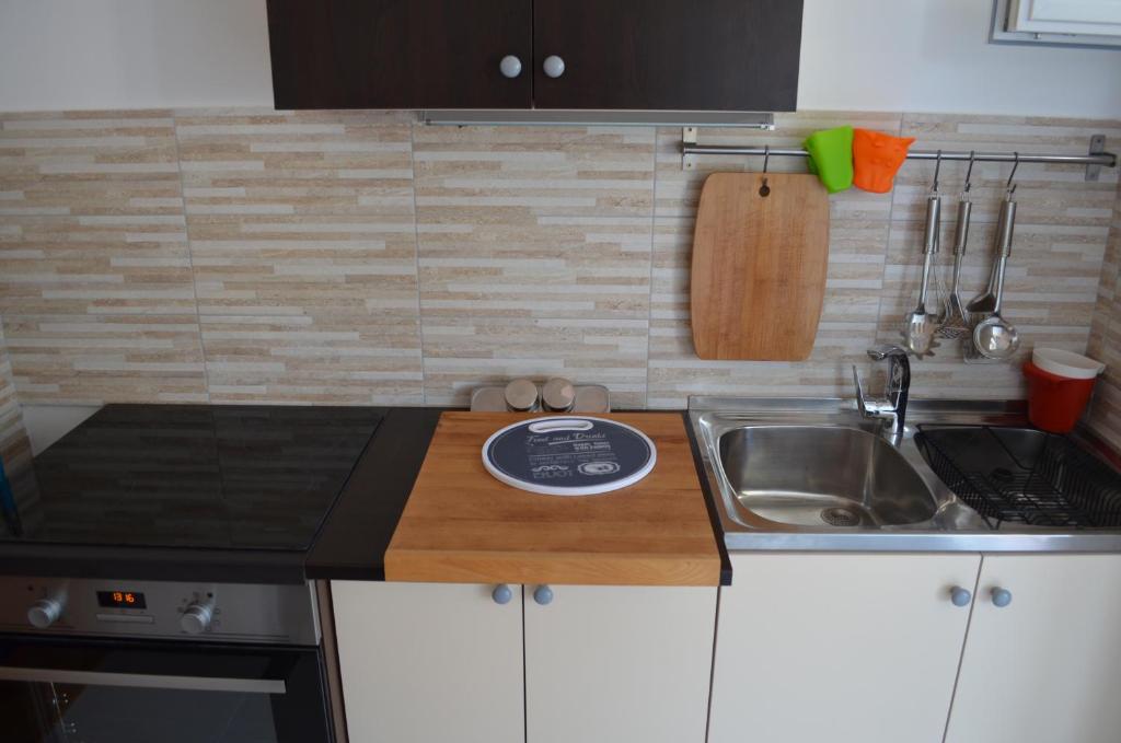 Kuchyň nebo kuchyňský kout v ubytování Apartments Mili