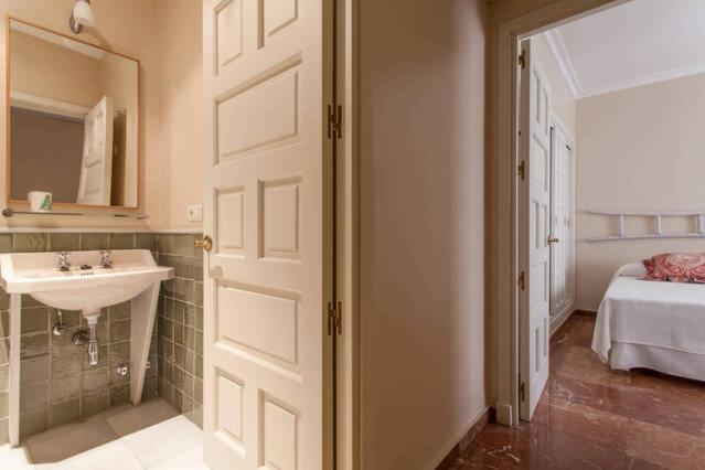 Postel nebo postele na pokoji v ubytování Apartamento Plaza Nueva