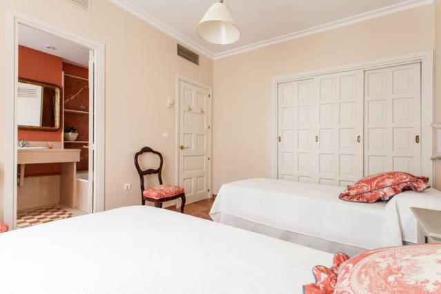 Postel nebo postele na pokoji v ubytování Apartamento Plaza Nueva