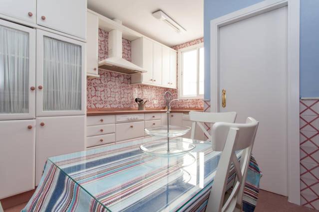 Kuchyň nebo kuchyňský kout v ubytování Apartamento Plaza Nueva